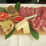 Cutting board of cured meats