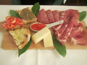 Cutting board of cured meats