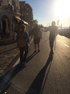 Walking in Loreto with the bastione pilgrim stick freshly blessed from a priest, Loreto, Marche