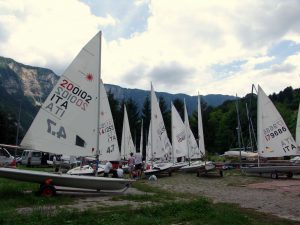 Sailing boats on Santa Croce Lake