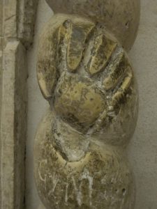 Centuries of pilgrims hands have worn away the stone in Saint Michael's Sanctuary, Monte Sant'angelo