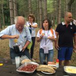 Enjoying local wine on Monte Cornachio