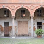 Pavia, door inside the courtyard of the 15th century Palazzo Orlandi