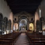 Chiesa di Sant'Ambrogio - the interior of the church. The Last Supper is located in the canopied apse to the left of the altar. Both sides of the church are laden with artwork